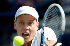 Tomáš Berdych v zápase s Kamkem (Dubaj 2013)