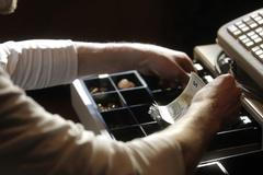 Euro peníze mince pokladna Lotyšsko nakupování