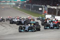 Mercedes Formula One driver Hamilton of Britain leads the pack during the Malaysian F1 Grand Prix at Sepang International Circuit outside Kuala Lumpur