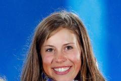 Gold medallist Eva Samkova of the Czech Republic poses during the victory ceremony for the women's snowboard cross competition at the 2014 Sochi Winter Olympics