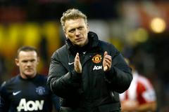 Manchester United manager Moyes reacts after their English Premier League soccer match against Stoke City at the Britannia Stadium in Stoke-on-Trent