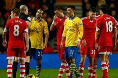 Arsenal's Flamini reacts as referee Mason sends him off during their English Premier League soccer match against Southampton at St.Mary's Stadium in Southampton