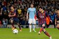 Barcelona's Lionel Messi scores a penalty against Manchester City during their Champions League round of 16 first leg soccer match at the Etihad Stadium in Manchester