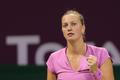 Petra Kvitova celebrates winning a point against Venus Williams during their Qatar Open women's tennis match in Doha