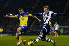 West Bromwich Albion's Matej Vydra challenges Everton's Seamus Coleman during their English Premier League soccer match at The Hawthorns in West Bromwich