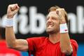 Stephane Robert of France celebrates defeating Martin Klizan of Slovakia during their men's singles match at the Australian Open 2014 tennis tournament in Melbourne