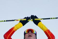 Eric Frenzel se raduje z první zlaté olympijské medaile v Soči