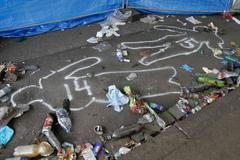 Snímky z Loveparade: Tímto tunelem si došli pro smrt