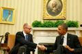 U.S. President Barack Obama shakes hands as he hosts a meeting with Ukraine Prime Minister Arseniy Yatsenyuk in the Oval Office of the White House in Washington