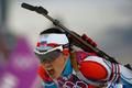Czech Republic's Vitkova reacts after crossing finish line in women's biathlon 15km individual event at 2014 Sochi Winter Olympics
