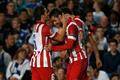 Atletico Madrid's Lopez celebrates with team mate Koke after scoring the first goal for the team during their Champions League semi-final second leg soccer match against Chelsea at Stamford Bridge Sta