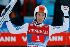 Austria's Diethart celebrates after winning the second jumping of the four-hills tournament in Garmisch-Partenkirchen