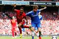 Chelsea's Kalas challenges Liverpool's Sterling during their English Premier League soccer match at Anfield in Liverpool