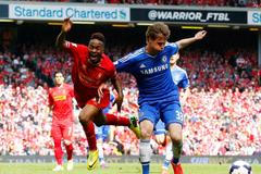 Chelsea's Kalas challenges Liverpool's Sterling during their English Premier League soccer match at Anfield in Liverpool