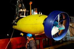 The Phoenix International AUV Artemis, also known as the Bluefin-21, is prepared for deployment from the Australian Defence Vessel Ocean Shield in the search for missing Malaysia Airlines Flight MH370