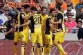 Atletico Madrid's players celebrate after they scored against Valencia during their Spanish first division soccer match in Valencia