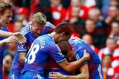 Chelsea's Ba celebrates with teammates after scoring a goal during their English Premier League soccer match against Liverpool at Anfield in Liverpool