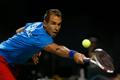 Czech Republic's Rosol returns shot against Japan's Daniel during Davis Cup quarter final tennis match in Tokyo