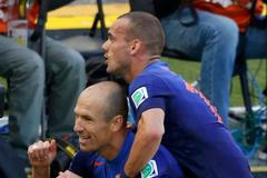 Robben and Sneijder of the Netherlands celebrate after scoring against Australia during their 2014 World Cup Group B soccer match at the Beira Rio stadium in Porto Alegre