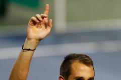 Czech Republic's Rosol reacts after winning the match against Japan's Daniel during their Davis Cup quarter final tennis match in Tokyo