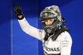 Mercedes Formula One driver Nico Rosberg of Germany celebrates after taking pole position at the qualifying session of the Bahrain F1 Grand Prix at the Bahrain International Circuit (BIC) in Sakhir