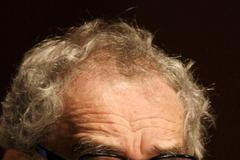 Colombian Nobel Prize laureate Gabriel Garcia Marquez listens to a speech during the New Journalism Prize awards ceremony at the Museum of Contemporary Art (MARCO) in Monterrey