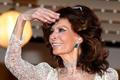 Actress Sophia Loren poses on the red carpet as she arrives for the screening of the film "Deux jours, une nuit" at the 67th Cannes Film Festival in Cannes