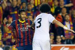 Real Madrid's Pepe pushes Barcelona's Neymar during King's Cup final soccer match in Valencia