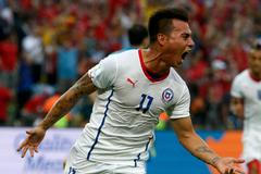 Chile's Eduardo Vargas celebrates scoring a goal during the 2014 World Cup Group B soccer match against Spain at the Maracana stadium in Rio de Janeiro