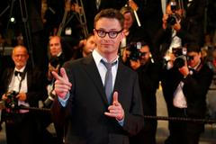 Jury member director Nicolas Winding Refn pose on the red carpet as he arrives for the screening of the film "Captives" in competition at the 67th Cannes Film Festival in Cannes