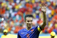 Netherlands Persie waves at fans during their 2014 World Cup Group B soccer match against Spain at the Fonte Nova arena in Salvador