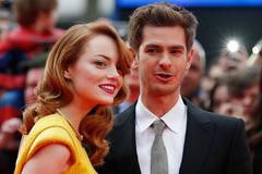 Actors Emma Stone and Andrew Garfield arrive at the world premiere of The Amazing Spiderman 2 in central London