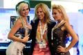 DJs Amie Rose and Nicolette Nightingale pose with attendee Theresa Harrell at the 2014 Electronic Entertainment Expo, known as E3, in Los Angeles