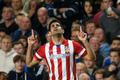 Atletico Madrid's Costa celebrates after scoring a penalty shot for the team during their Champions League semi-final second leg soccer match against Chelsea at Stamford Bridge Stadium in London