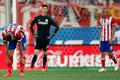 Atletico Madrid's Alderweireld, goalkeeper Courtois and Miranda react after conceding a goal against Malaga during their Spanish first division soccer match in Madrid
