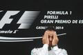 First placed Mercedes Formula One driver Hamilton of Britain reacts on podium after the Spanish F1 Grand Prix at the Barcelona-Catalunya Circuit in Montmelo