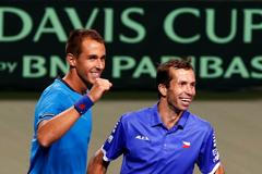 Rosol and Stepanek of Czech Republic celebrate after winning their Davis Cup quarter-final men's doubles tennis match against Japan's Ito and Uchiyama in Tokyo