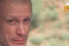 U.S. Army Sergeant Bowe Bergdahl waits in a pick-up truck before he is freed at the Afghan border