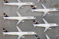 File aerial photo shows Lufthansa planes parked on the tarmac of the closed Frankfurt's airport