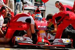Ferrari Formula One driver Alonso of Spain performs a pit stop during the first practice session of the Spanish F1 Grand Prix at the Barcelona-Catalunya Circuit in Montmelo