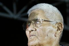File of World War II Navajo code talker Chester Nez on stage at a campaign rally with Democratic presidential nominee John Kerry in Albuquerque