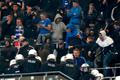German riot police enters Hamburg SV supporters' block during break of their German Bundesliga first division soccer match against Bayern Munich in Hamburg
