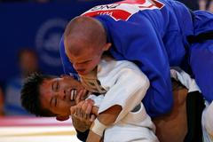 Hry Commonwealthu: Danny Williams, Anglie (nahoře) a Adrian Leat, Nový Zéland - judo