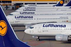 Aircraft of German airline Lufthansa are parked on the apron at Fraport airport in Frankfurt
