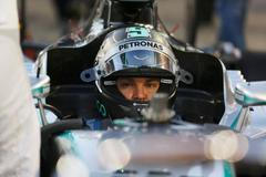 Mercedes Formula One driver Nico Rosberg of Germany sits in his car before the start of the Bahrain F1 Grand Prix at the Bahrain International Circuit (BIC) in Sakhir