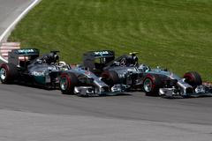 Mercedes Formula One driver Rosberg of Germany cuts inside Mercedes Formula One driver Hamilton of Britain on the start during the Canadian F1 Grand Prix at the Circuit Gilles Villeneuve in Montreal
