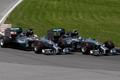 Mercedes Formula One driver Rosberg of Germany cuts inside Mercedes Formula One driver Hamilton of Britain on the start during the Canadian F1 Grand Prix at the Circuit Gilles Villeneuve in Montreal