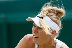 Video: Wozniacká a její incident s vlasy na US Open