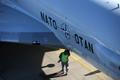 NATO soldier inspects a AWACS aircraft at AWACS air base in Geilenkirchen, near the German-Dutch border