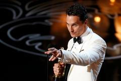 Matthew McConaughey accepts the Oscar for best actor for his role in "Dallas Buyers Club" at the 86th Academy Awards in Hollywood